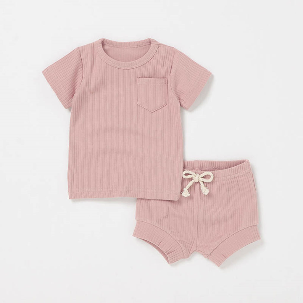 2 piece summer pajama set in pink.  The set consists of a short sleeve top and matching pull on shorts.  It is made from super soft GOTS certified organic cotton.